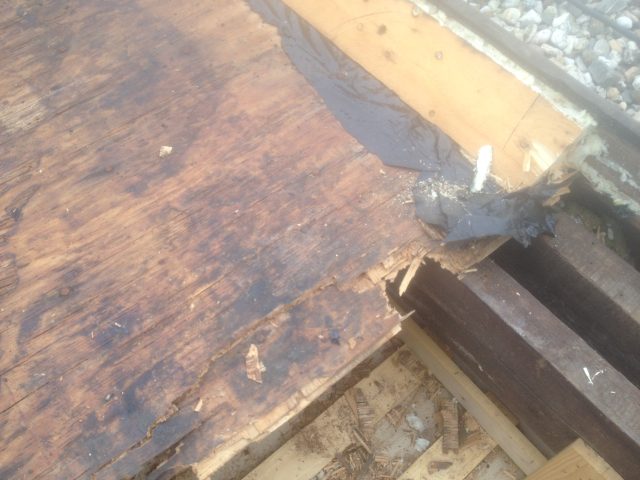 Verwijdering rot dakbeschot